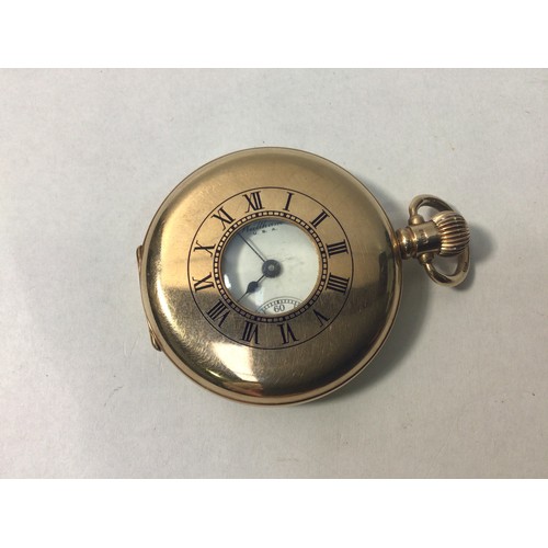 184 - A 9ct gold cased Waltham half-hunter pocket watch, the case front with circular window surrounded by... 