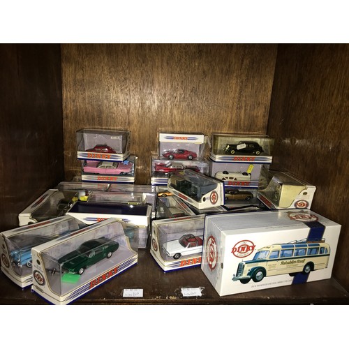 301 - SECTION 49. A collection of 24 assorted boxed Dinky die-cast model cars including a ‘1967 Ford Musta... 