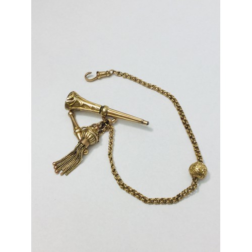 198 - A 9ct yellow gold watch chain with tassle fob, weighing 9.9 grams. (rolled gold seal not included in... 