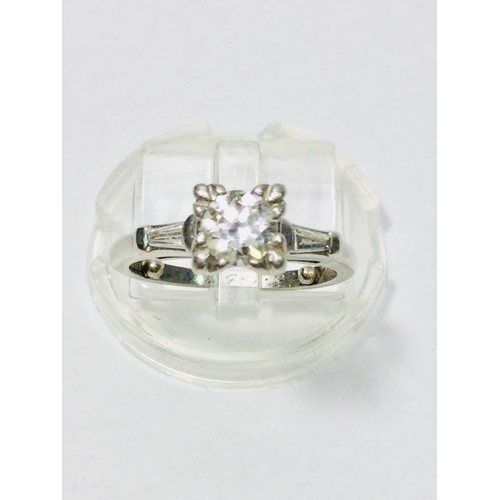 213 - A ladies Platinum solitaire ring, set with a round brilliant cut diamond, H colour, SI clarity, diam... 