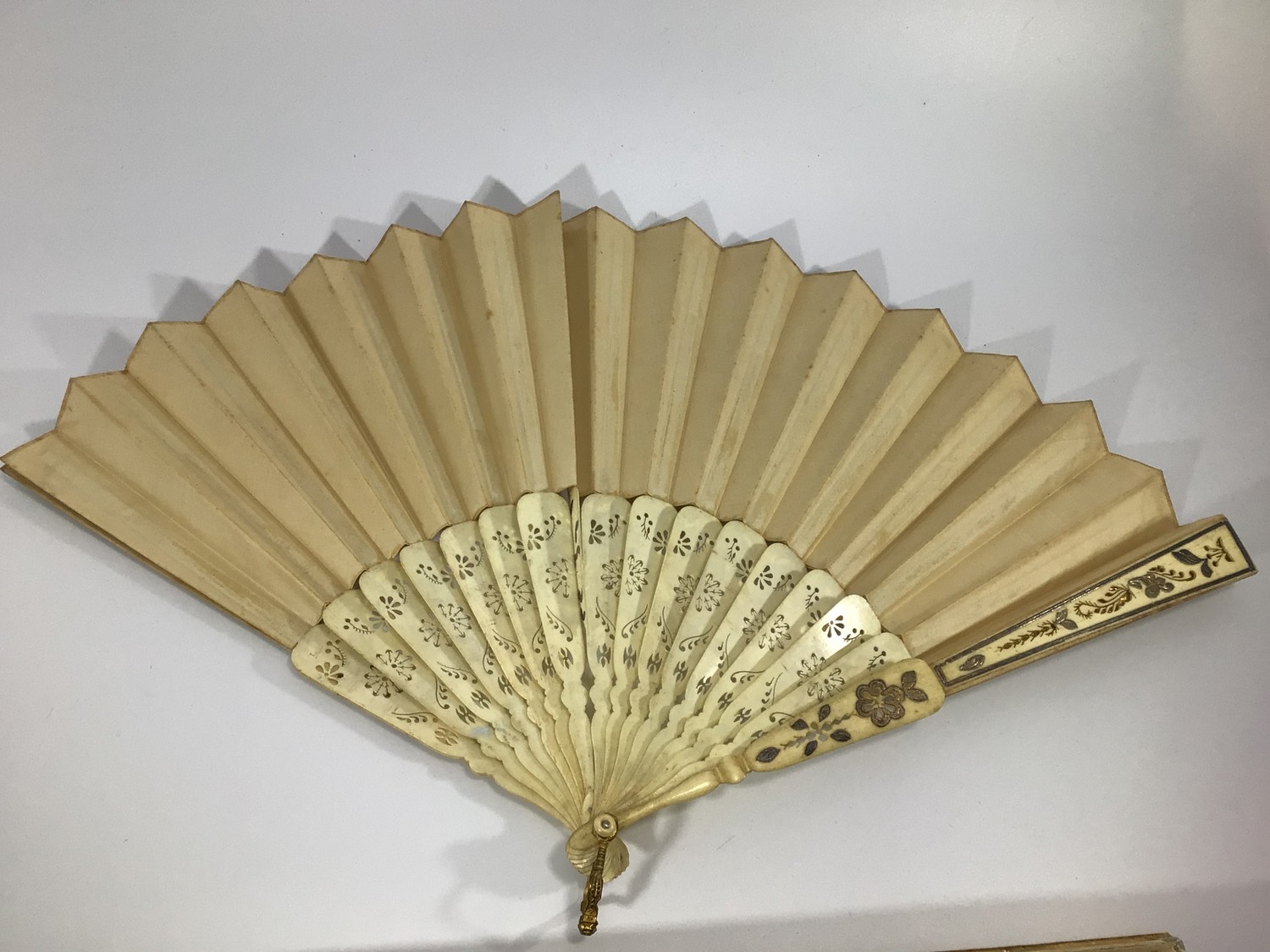 A late 19th century hand painted ivory fan by J Duvelleroy, in original ...