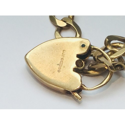133 - A 9ct yellow gold curb link chain, weighs 25.6 grams, measures 22 inches in length.