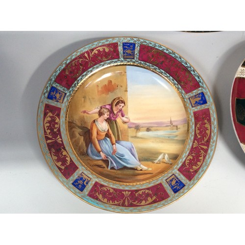 48 - An early 19th century Vienna porcelain cabinet plate, hand-painted to the centre with two young ladi... 