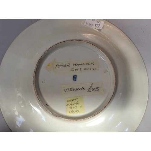 48 - An early 19th century Vienna porcelain cabinet plate, hand-painted to the centre with two young ladi... 