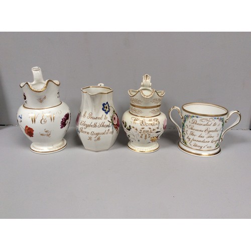 53 - An early 19th century Staffordshire porcelain two-handled loving cup painted with roses and gilt ins... 