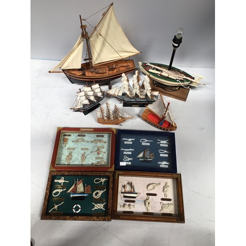 269 - A lamp modelled as a rowing boat, together with five various model boats including The Cutty Sark an... 