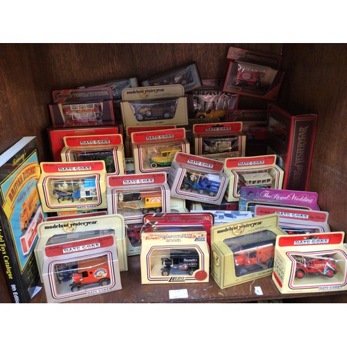 323 - SECTION 54. A collection of approximately 50 assorted boxed die-cast model vehicles, predominantly L... 