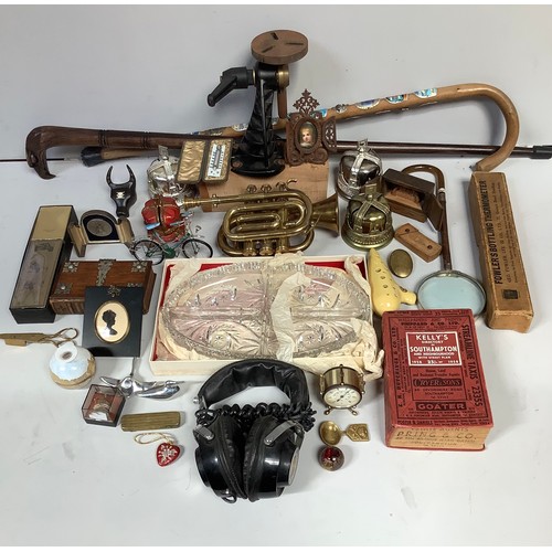 325 - A mixed lot of collectables including a cornet by Bessons & Co London, sugar thermometer, 1958 Kelly... 