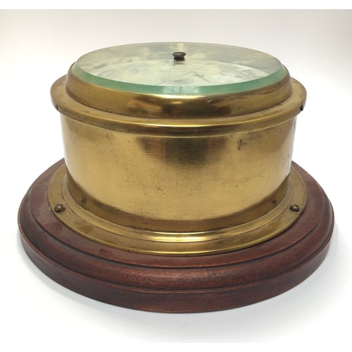 423 - A brass cased ship’s bulkhead barometer with white enamel dial marked ‘Whyte Thomson & Co, Glasgow &... 