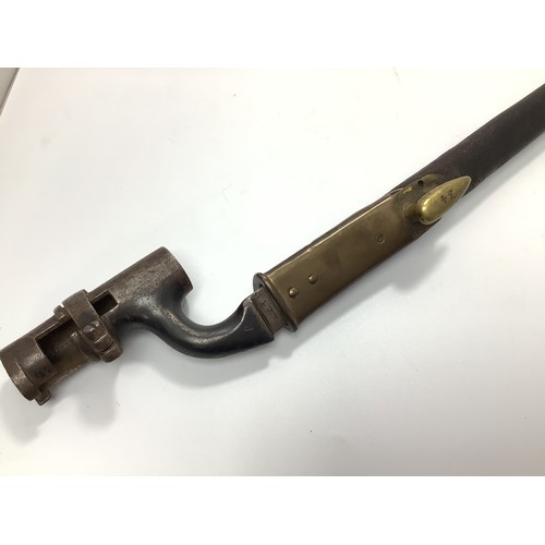 426 - An 1895 pattern Martini Enfield bayonet with 54cm triform blade marked with various numbers in brass... 