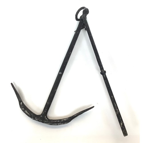 431 - A black painted marine anchor, 94cm high