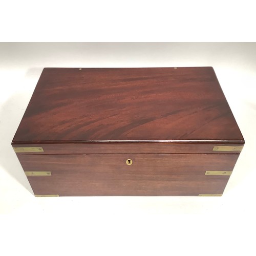446 - A Victorian mahogany campaign folding writing slope with brass corners, twin side drawers with brass... 