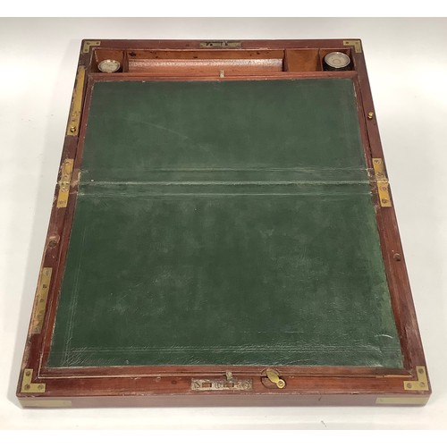 446 - A Victorian mahogany campaign folding writing slope with brass corners, twin side drawers with brass... 