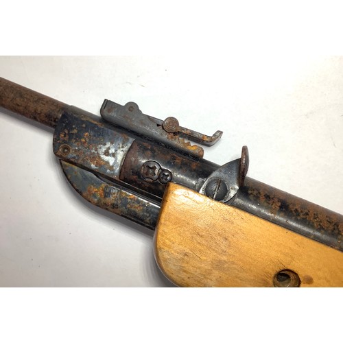447 - A Chinese .22 air rifle with thumb release break barrel, foresight and adjustable rear sight, varnis... 