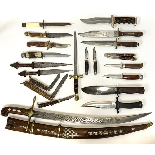448 - Twenty one various swords and daggers including an Indo-Persian shamshir with engraved curved blade ... 