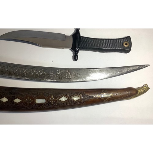 448 - Twenty one various swords and daggers including an Indo-Persian shamshir with engraved curved blade ... 