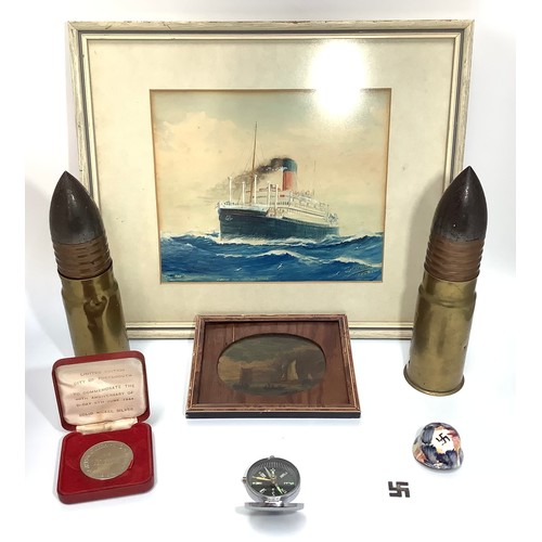 455 - A pair of British approx. 45mm brass and copper military rounds by Elswick Ordnance Company, togethe... 