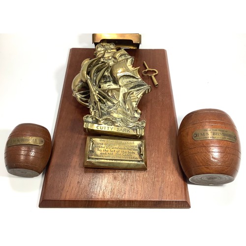 456 - A large brass door knocker  cast with The Cutty Sark, with quote by Ella Wheeler Wilcox, together wi... 