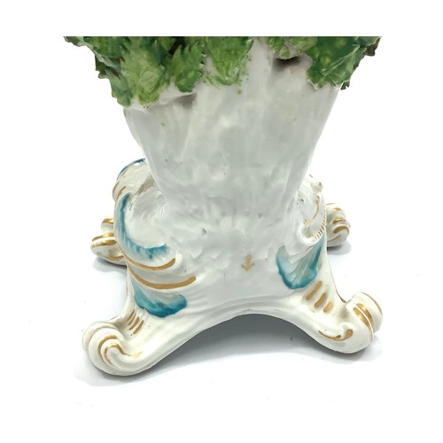 2 - A Chelsea Gold Anchor figure of a drummer boy, modelled on a rococo base against floral bocage, 'gol... 