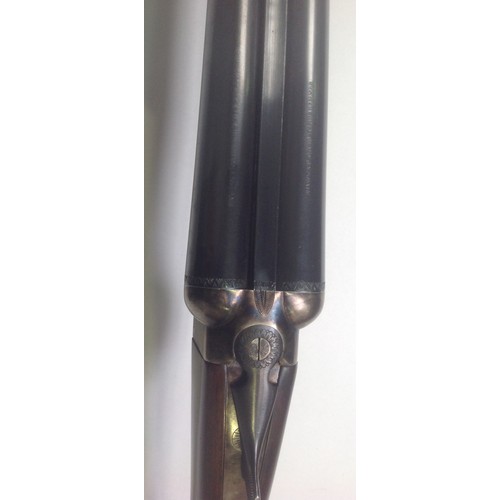 444 - A 20-bore double-barrel shotgun by Ignacio Ugartechea, with 26.75' inch side by side blued-steel bar... 