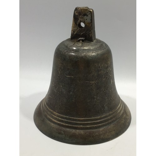 219a - A 19th century bronze bell and clapper marked ‘19’ to top of bell, three band decorative belt, 19cm ... 