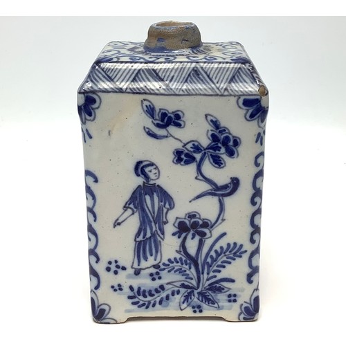 19 - An 18th century Dutch Delft pottery tea canister, painted in underglaze blue with bird and figural c... 