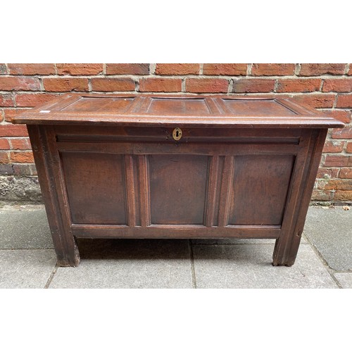 608 - An 18th Century oak three panelled coffer, on stile supports, 104cm wide