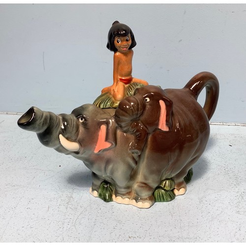 26 - A Walt Disney Classics Collection Jungle Book porcelain figure of Baloo with Mowgli on his shoulders... 