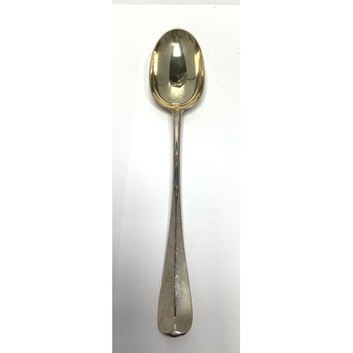 97 - An Edwardian old English pattern silver basting spoon by the Goldsmiths & Silversmiths Co Ltd, hallm... 