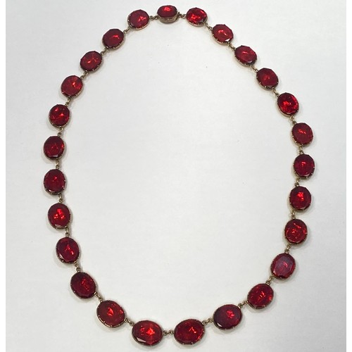 151 - A 19th century Georgian yellow metal (tests as 14ct) garnet 'coloured' paste stone rivière necklace ... 