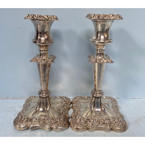 83 - A pair of loaded silver candlesticks by I S Greenberg, with hallmarked, removable sconces and taperi... 