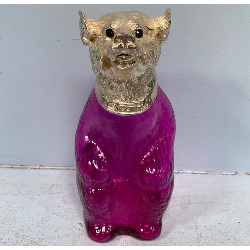 103 - An unusual novelty decanter formed as a bear with cranberry glass body and silvered hinged head, bea... 