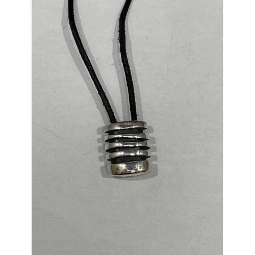 189 - A Georg Jenson Strata silver black pendant, on black leather cord, Design No 203,
designed by Anette... 