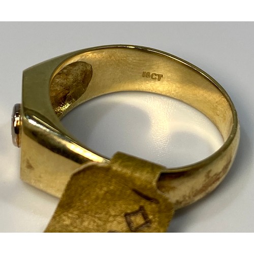 179 - An 18ct yellow gold dress ring set with a round brilliant cut diamond to the centre of a square shap... 