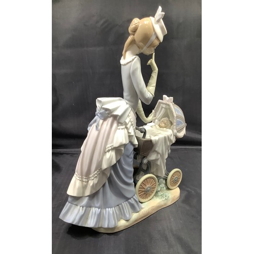 49 - A Lladro figure 'Baby's First Outing', designed by Salvador Debon, model number 4938, in original bo... 