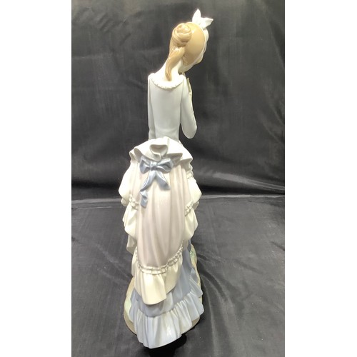 49 - A Lladro figure 'Baby's First Outing', designed by Salvador Debon, model number 4938, in original bo... 