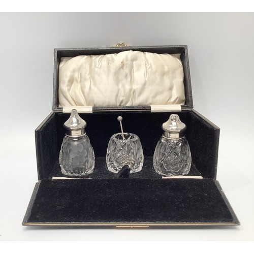 80 - A collection of assorted silver topped toilette jars including a cased three-piece cruet set by Syny... 