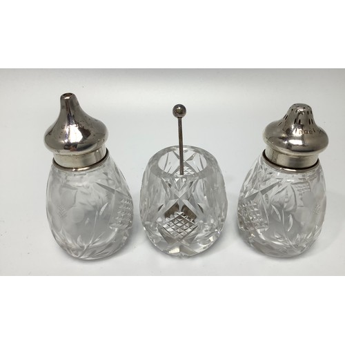 80 - A collection of assorted silver topped toilette jars including a cased three-piece cruet set by Syny... 