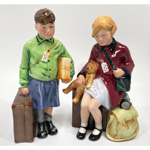 13 - A pair of Royal Doulton figures of child evacuees, ‘The Boy Evacuee’ HN3202 limited edition no. 6559... 