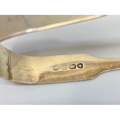 71 - A small collection of assorted silver wares comprising a pair of Georgian sugar tongs, hallmarked Lo... 