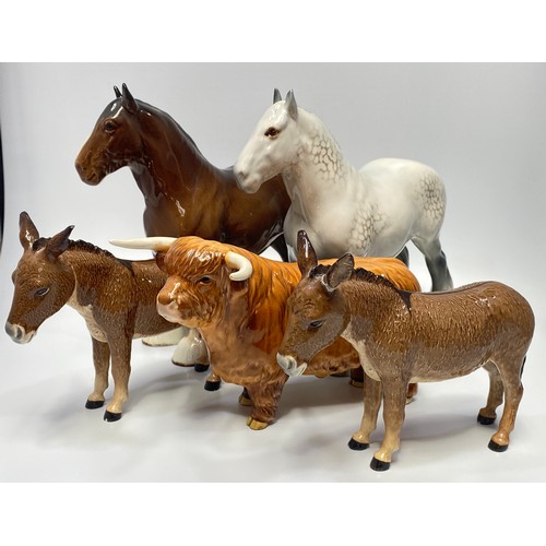 47 - Five assorted Beswick pottery animals comprising a dapple grey Shire horse and another shire horse, ... 