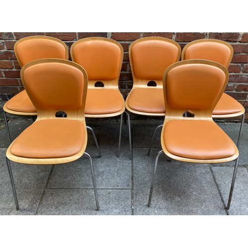 617 - A set of six bent plywood stacking chairs by RDS AKABA, each with stuffed orange seats and back rest... 