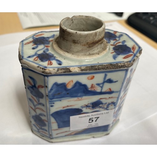 57 - An early 18th century Chinese porcelain canted rectangular tea caddy or canister, painted in undergl... 