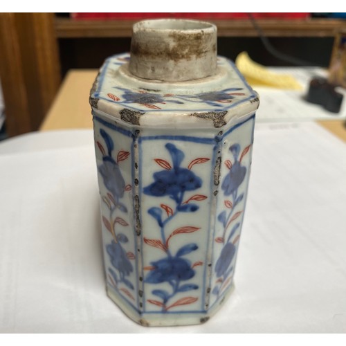 57 - An early 18th century Chinese porcelain canted rectangular tea caddy or canister, painted in undergl... 