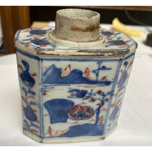 57 - An early 18th century Chinese porcelain canted rectangular tea caddy or canister, painted in undergl... 