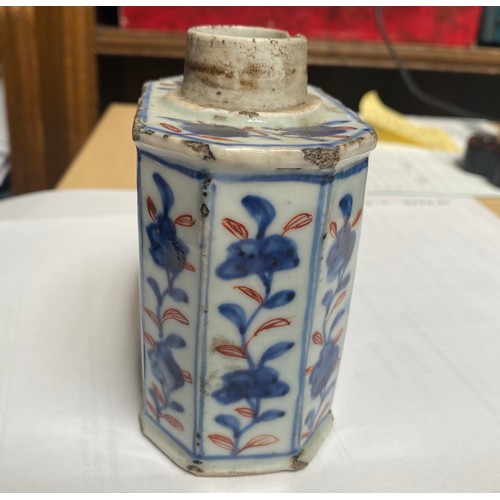 57 - An early 18th century Chinese porcelain canted rectangular tea caddy or canister, painted in undergl... 