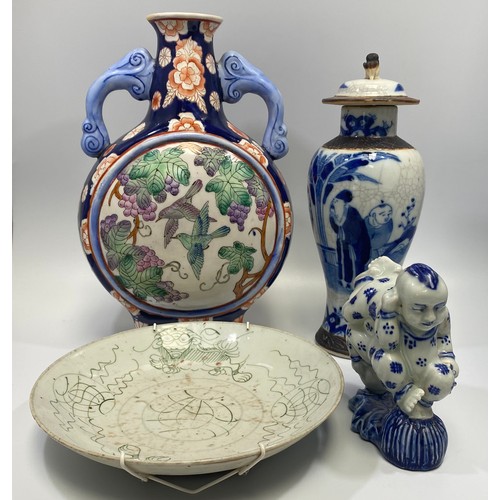 99 - Various Chinese porcelain including two tumbling acrobats, crackle-glaze figural baluster vase and c... 