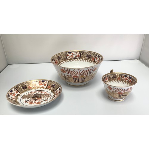 10 - Three 19th century Spode porcelain items including a cup, small plate and a bowl, all in the Imari p... 