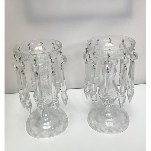 2 - A pair of clear glass lustres with criss-cross etching and clear cut glass prism drops, 21cm high, t... 