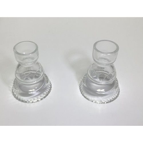 2 - A pair of clear glass lustres with criss-cross etching and clear cut glass prism drops, 21cm high, t... 